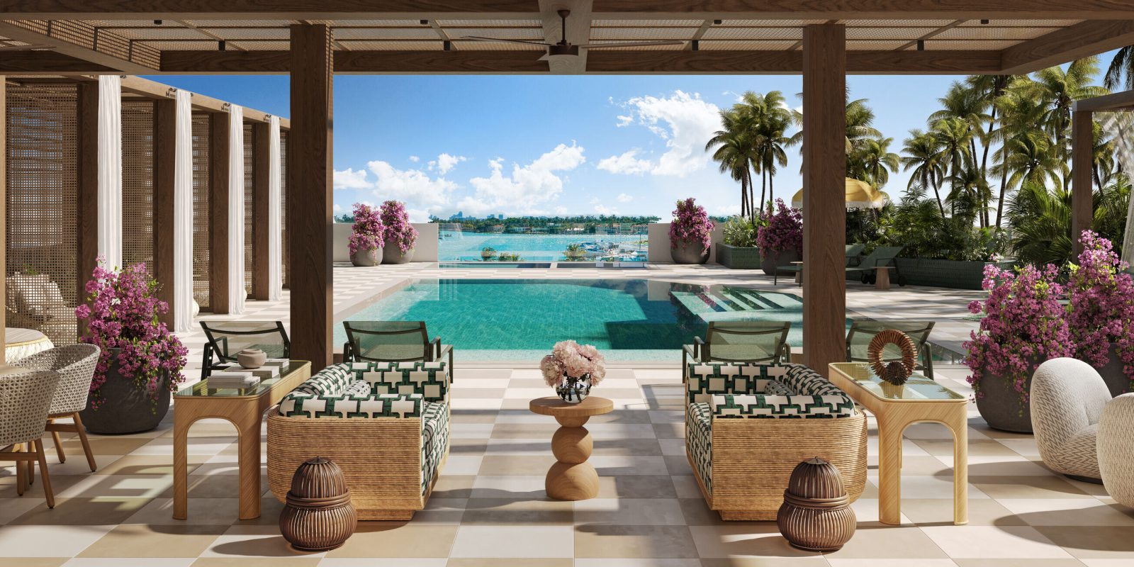 Covered lounge terrace with rattan furniture and pink bougainvillea overlooking the pool and marina at PALMA Miami Beach
