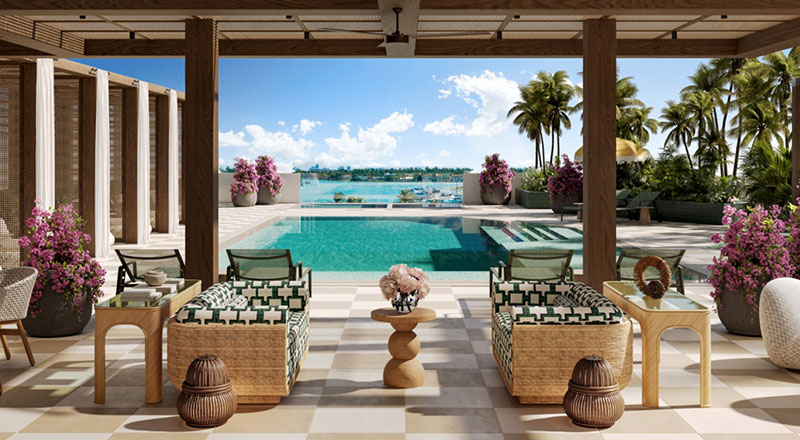 Wooden pergola lounge with palm trees framing the pool and marina view