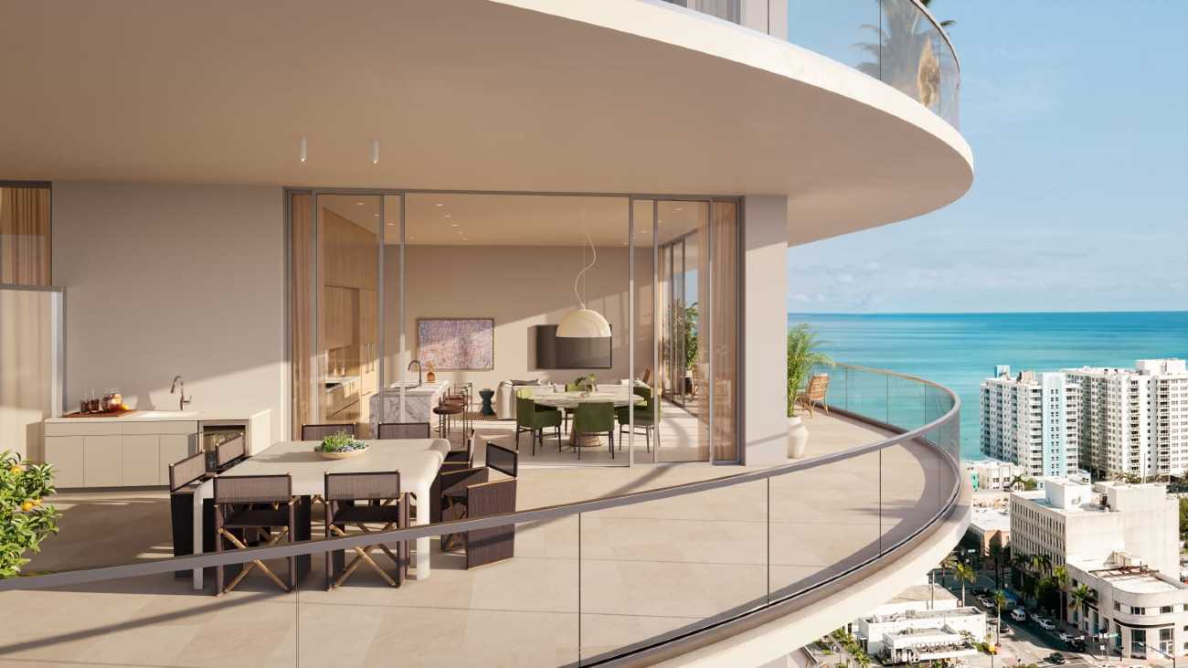 Vertical aerial view of the PALMA Miami Beach tower with rooftop pool deck and ground-floor retail
